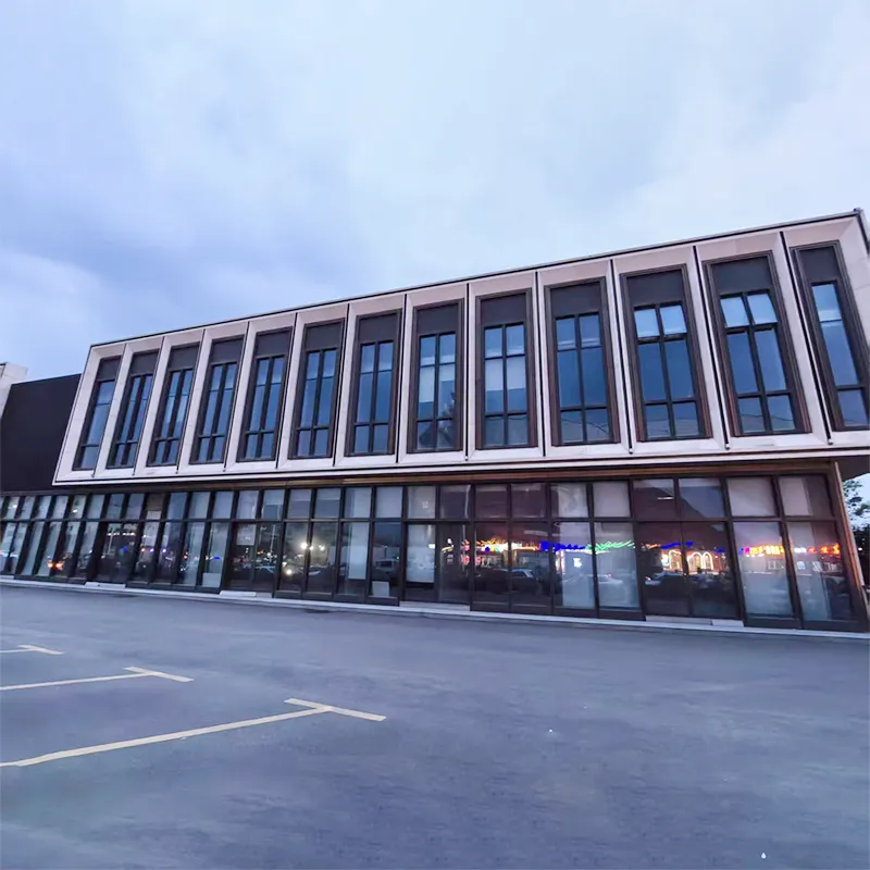 Kas yra užuolaidų sieninis stiklas ir kaip jis gali pakeisti šiuolaikinius komercinius pastatus